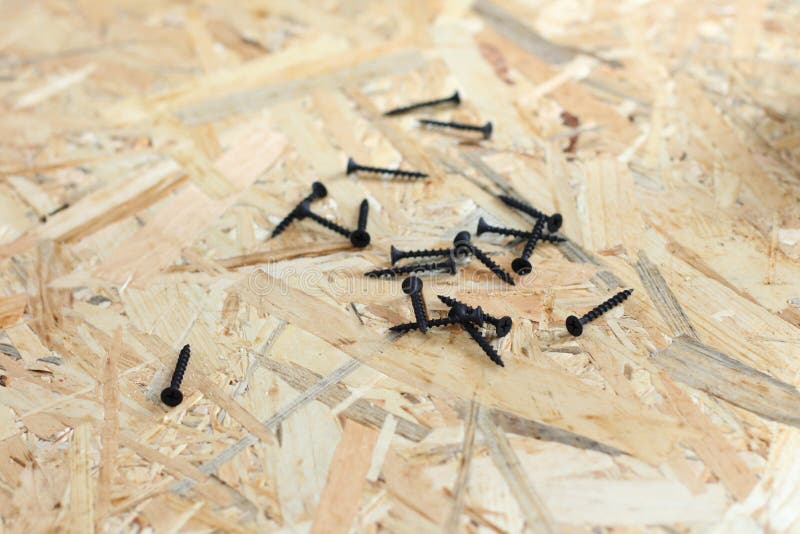 Screed screws on osb plywood stock photography